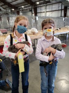 Molly and Macie Cowan with chickens