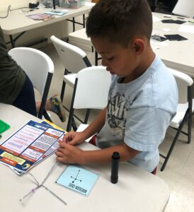 child working on a project