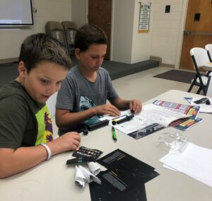 two children working on a project