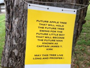 sign on an apple tree