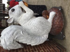 white squirrel statue