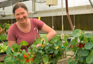 Rachel Meriwether in the greenhouse