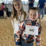 Children wearing numbers for show