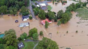 An aerial view of a flooded neighborhood in Watauga County, North Carolina, after Hurricane Helene devastated the area in late 2024.